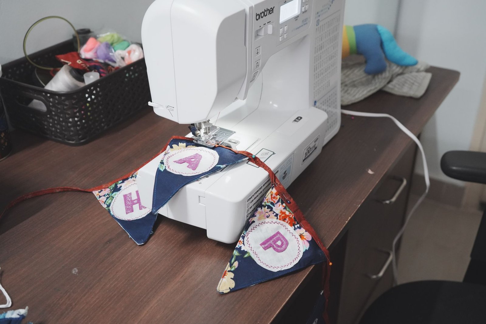 Quilted fabric applique craft featuring an animal pattern design