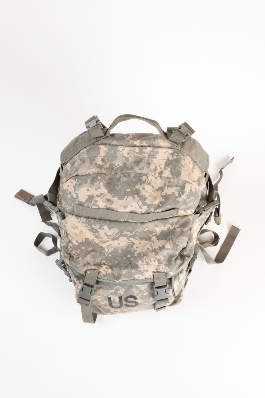 A durable camouflage nylon backpack, the kind of gear often made from ripstop fabric