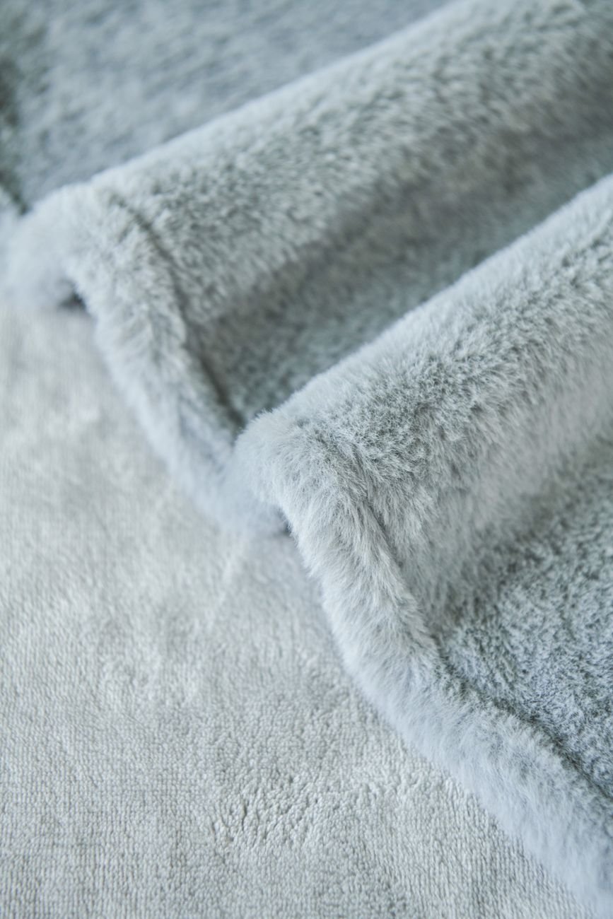 Close-up of soft minky fabric showing its short, dense plush pile