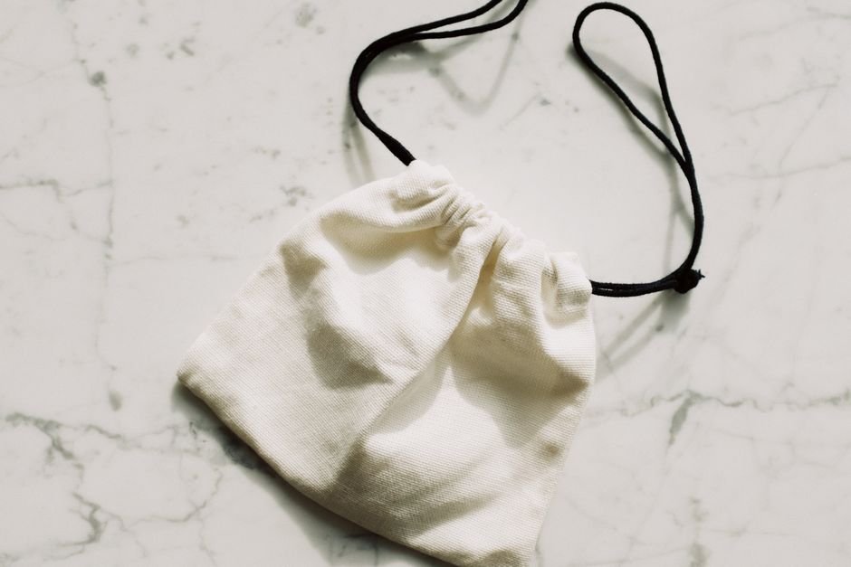 Simple natural canvas drawstring pouch made from duck cloth style fabric