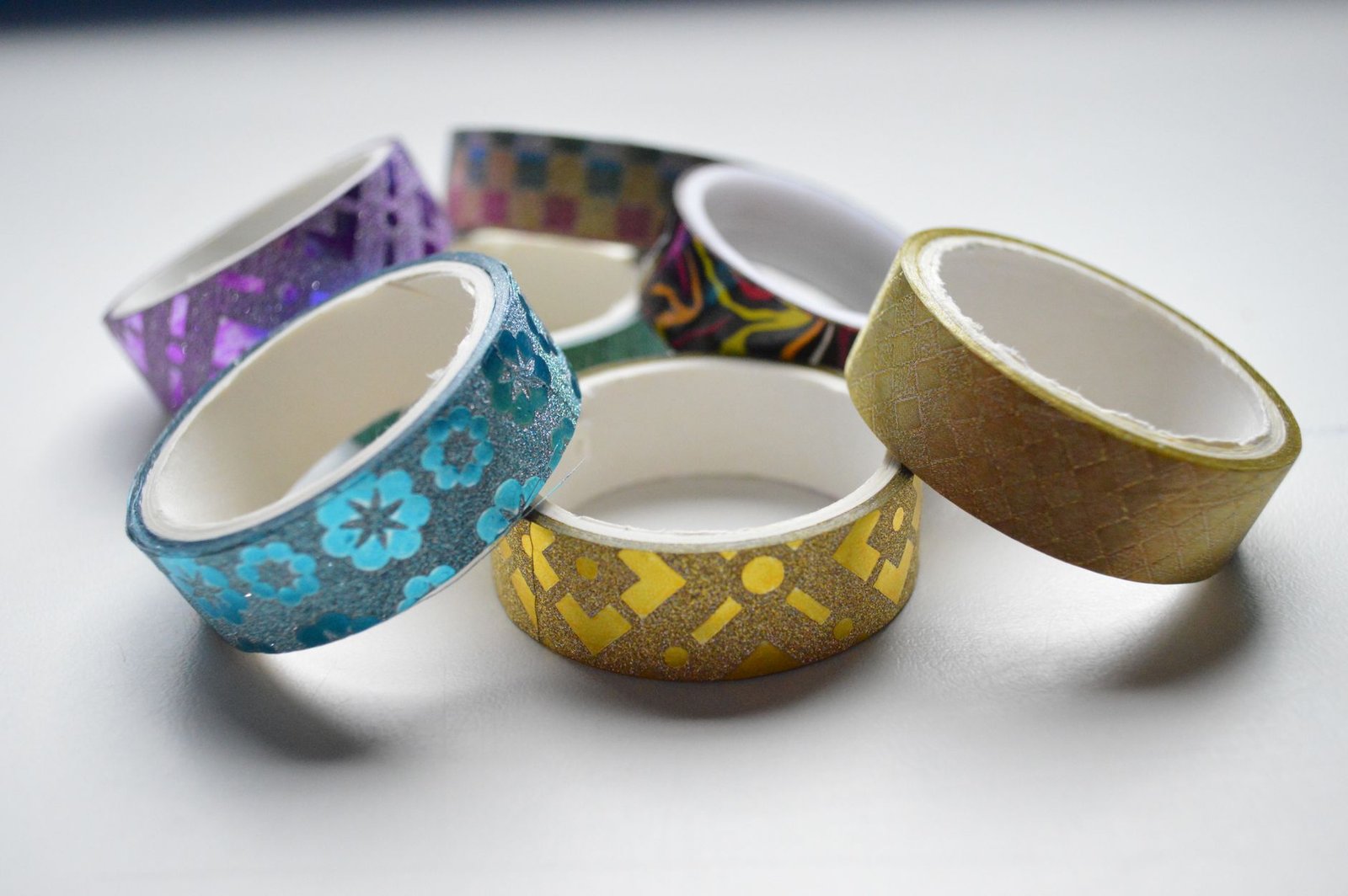 Decorative patterned tape rolls stacked together